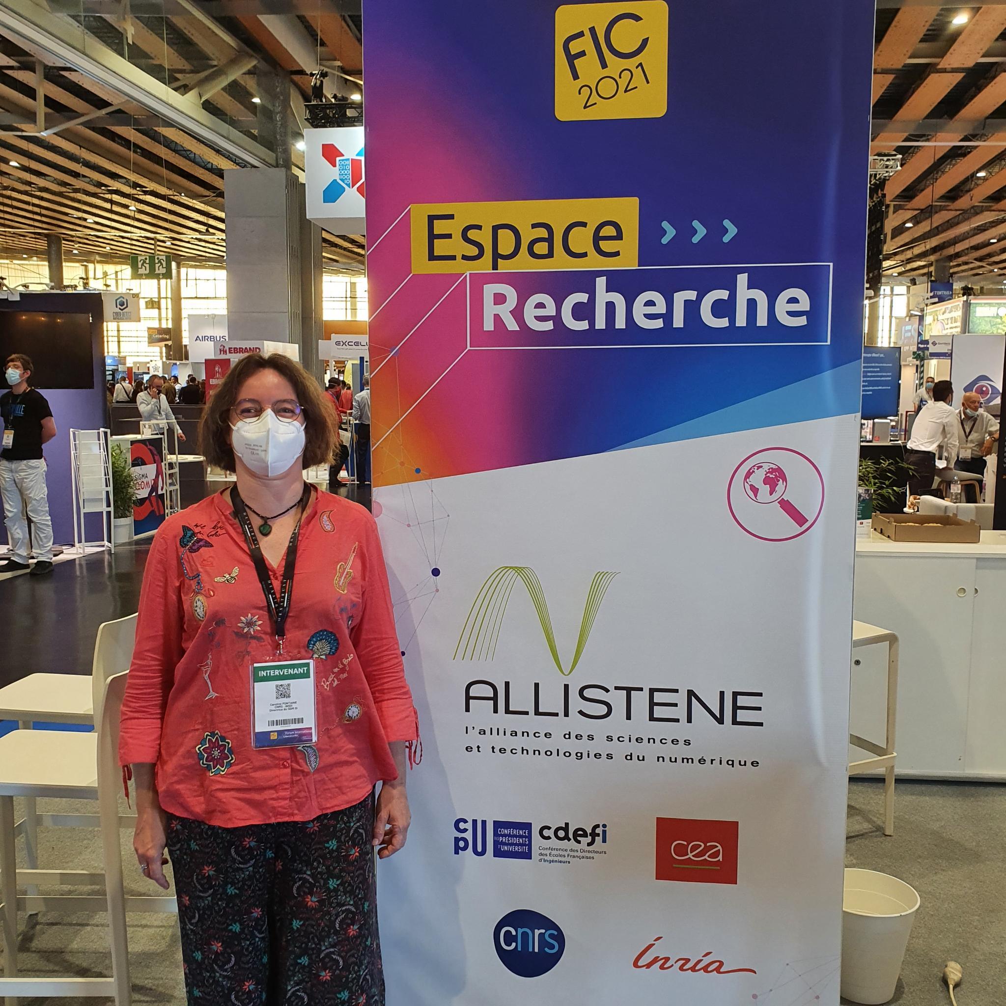 Caroline Fontaine at the CNRS-INS2I booth at FIC 2021 Caroline Fontaine at the CNRS-INS2I booth at FIC 2021